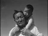2 July 1942. Manzanar Relocation Center, Manzanar, California. Grandfather and grandson of Japanese ancestry at this War Relocation Authority center. National Archives, 537994.