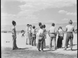 2 July 1942. Manzanar Relocation Center, Manzanar, California. Baseball is the most popular recreation at this War Relocation Authority center with 80 teams having been formed throughout the Center. Most of the playing is done between the barrack blocks. National Archives, 538065.